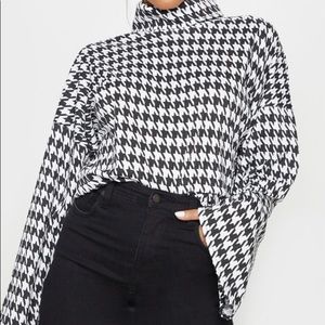 Mono Dogtooth Print Roll Neck Oversized sweater!